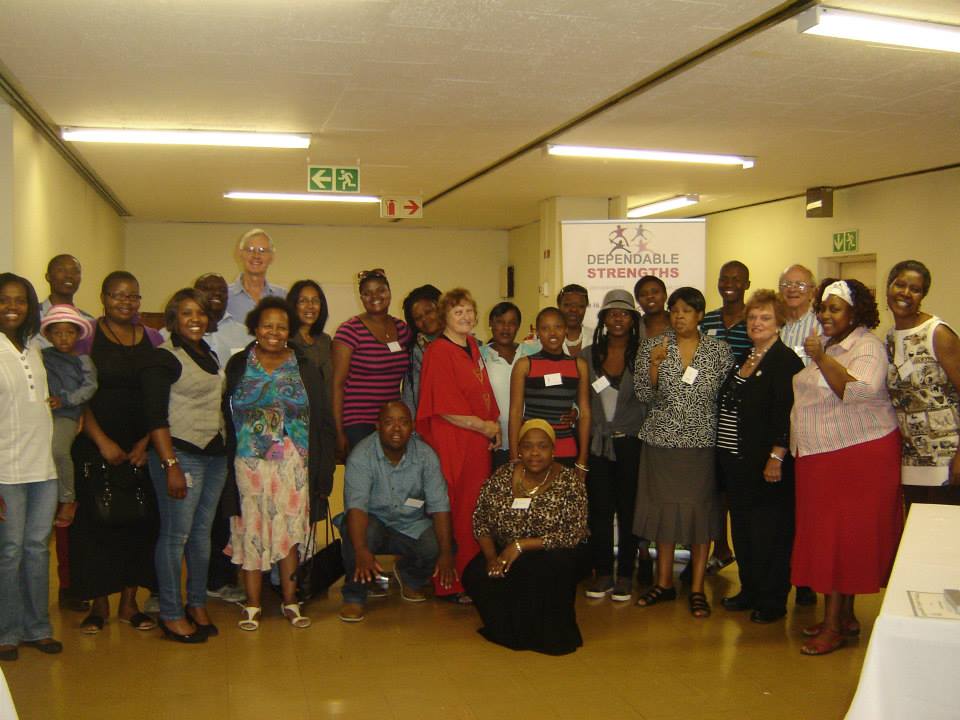 Facilitators, partners and friends at a community gathering